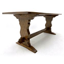 ‘Gnomeman’ oak dining table, rectangular adzed top, shaped end supports on sledge feet joined by pegged stretcher, carved with gnome signature, by Thomas Whittaker of Littlebeck