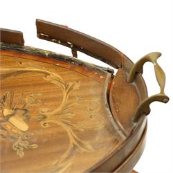 Edwardian Sheraton Revival inlaid mahogany and satinwood marquetry oval two-tier étagère occasional table, the oval top with removable glazed tray with brass handles, over an ornately inlaid top with central patera motif and trailing foliate scrolls, the splayed uprights inlaid with bellflowers, over a matched inlay under-tier, raised on splayed supports united by curved X-stretcher,  retailed by David Hick Interiors, Jersey