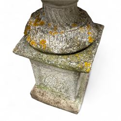 Pair of cast stone ornate garden urns, on plinth bases