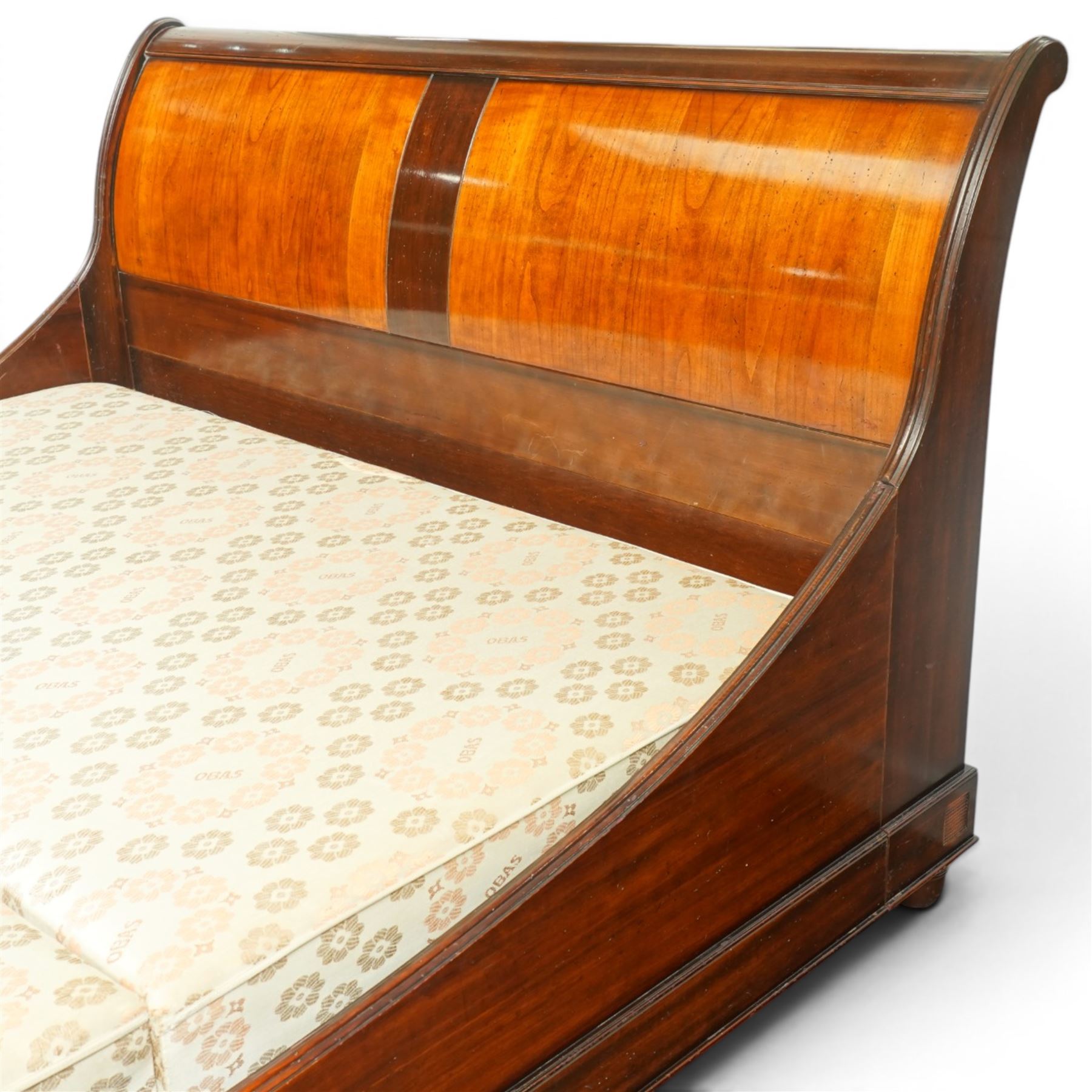 And So To Bed - super king size 'Palais' sleigh bed, with curved headboard and footboard, figured veneer panels, contrasting inlaid-style banding and upholstered base panels