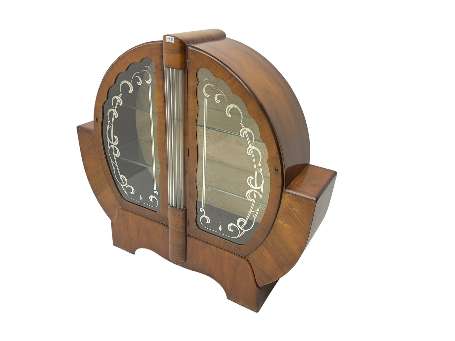 Art Deco walnut display cabinet, of circular design, fitted with two shaped glazed doors enclosing two glass shelves, flanking five glass rods