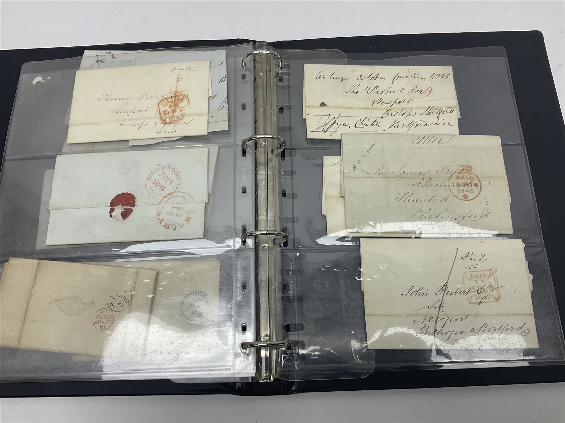 Postal history, including pre-stamp, Queen Victoria imperf penny reds on covers or entires a few with black MX cancels, 1841 two pence blue with white lines added on mourning cover, perf penny red on cover etc, housed in a ring binder folder