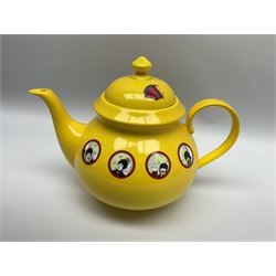 Limited edition Beatles Yellow Submarine teapot, designed by Paul Smith and made for Thomas Goode, 4/200, together with matching egg cups, 25/200, both in original boxes. 