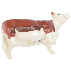 Beswick Hereford cows family group, comprising Bull, Ch. of Champions 1363, Hereford cow Ch of Champion 1360, and calf 1827, together with another Hereford Bull