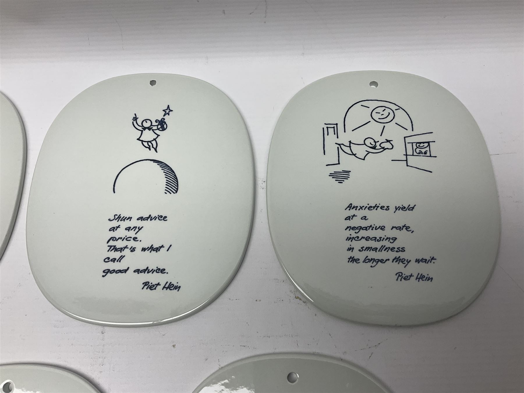 Seven Royal Copenhagen Piet Hein 1948-1980 plaques,all with printed mark to back H17cm