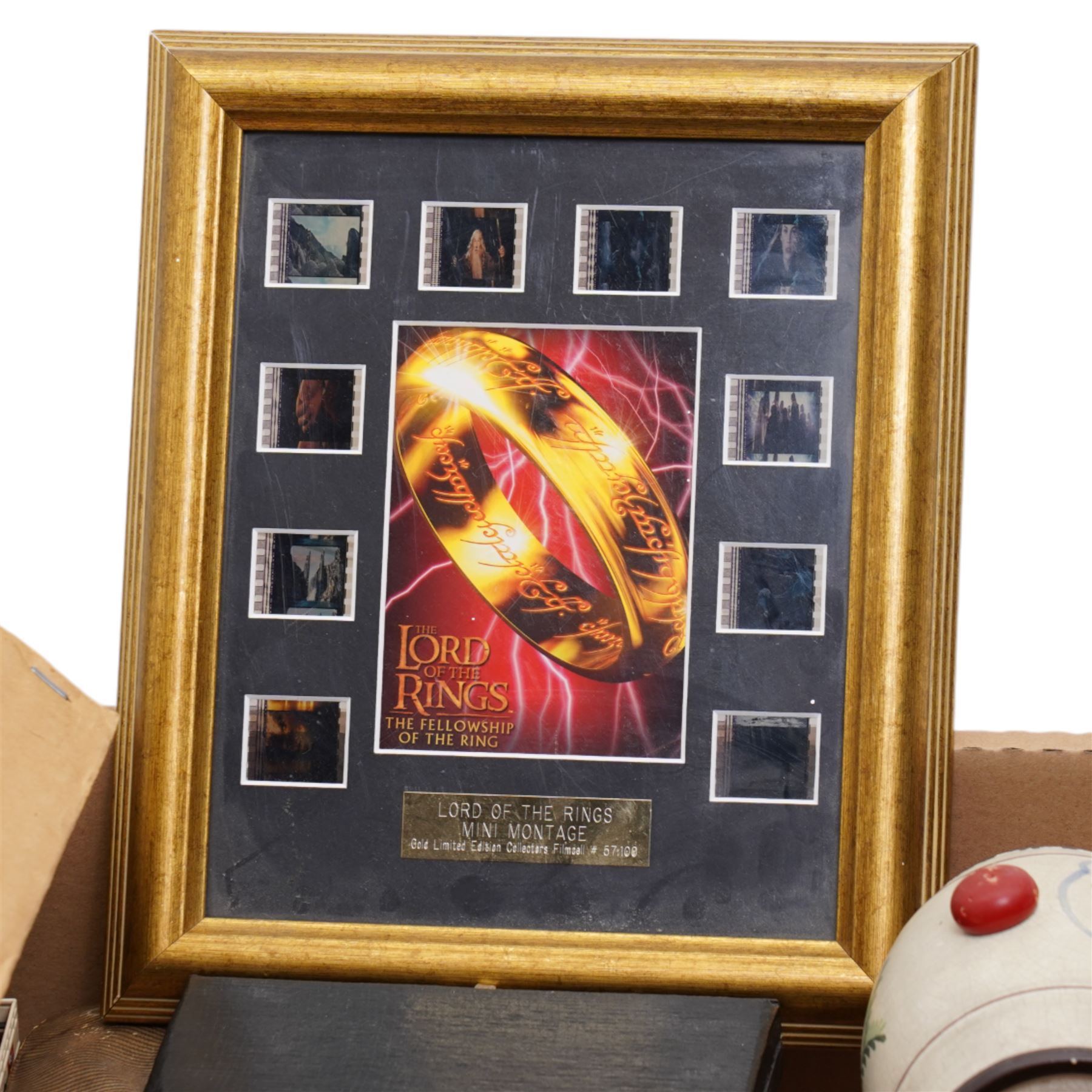 Case of dentist implements, cigarette card album, various loose cards, cigarette dispenser, die cast model vehicles, Lord of the Rings film cell montage etc