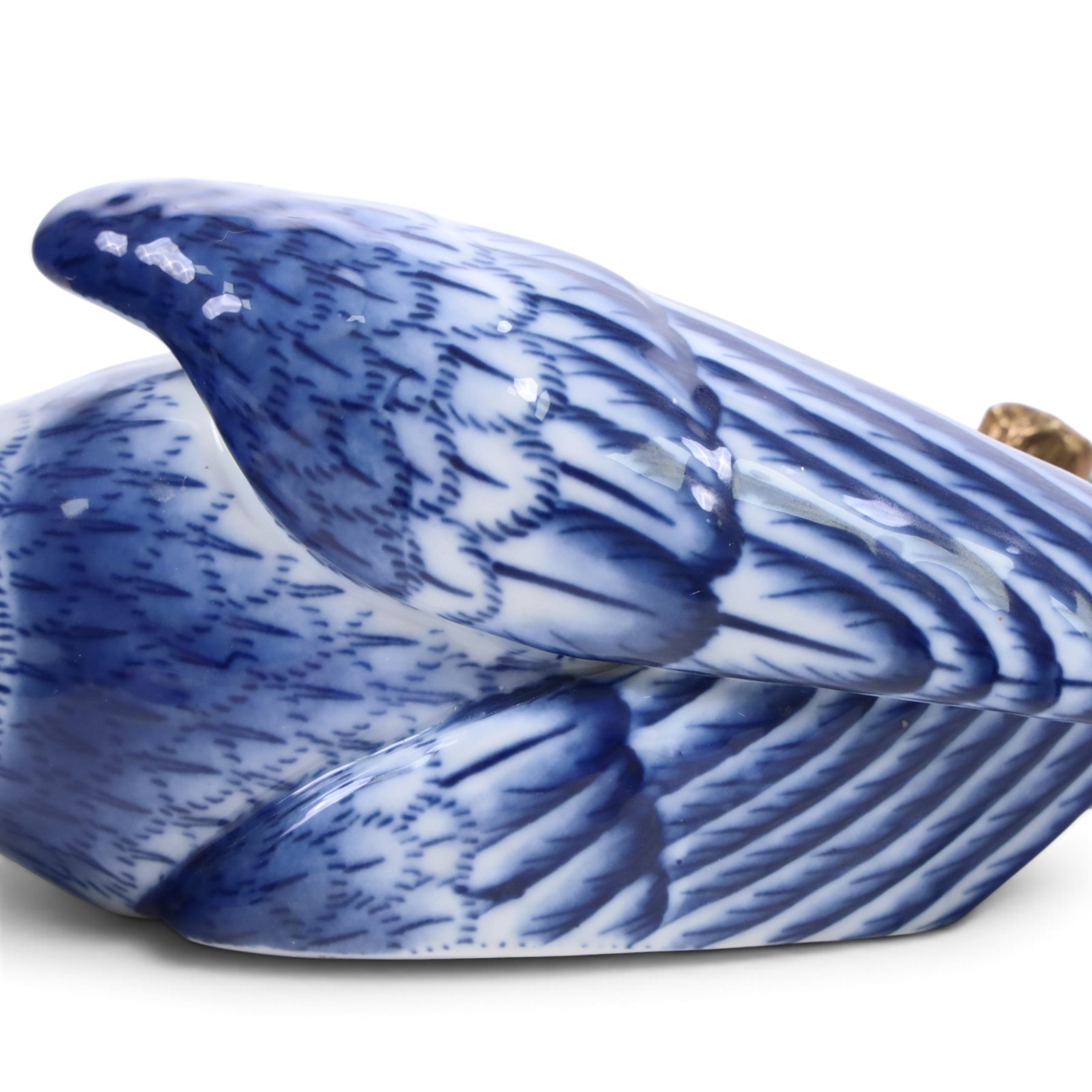 Pair of wall sconces, modelled as blue parrot upon a gilt branch, H47cm