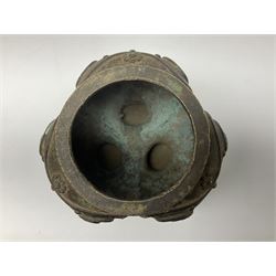 Chinese Qing dynasty bronze elephant censer, of tripod form, the lobed body cast as the heads of three elephants with floral trappings, upon three legs modelled as elephant feet, H12cm rim D9.5cm