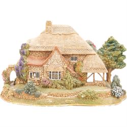 Eight Lilliput Lane models, comprising Heritage Collection Buckingham Palace, Crown Inn, Anne Hathaway, Periwinkle Cottage, Royal Oak Inn, Through The Keyhole, Burley Street Garage and The George Inn