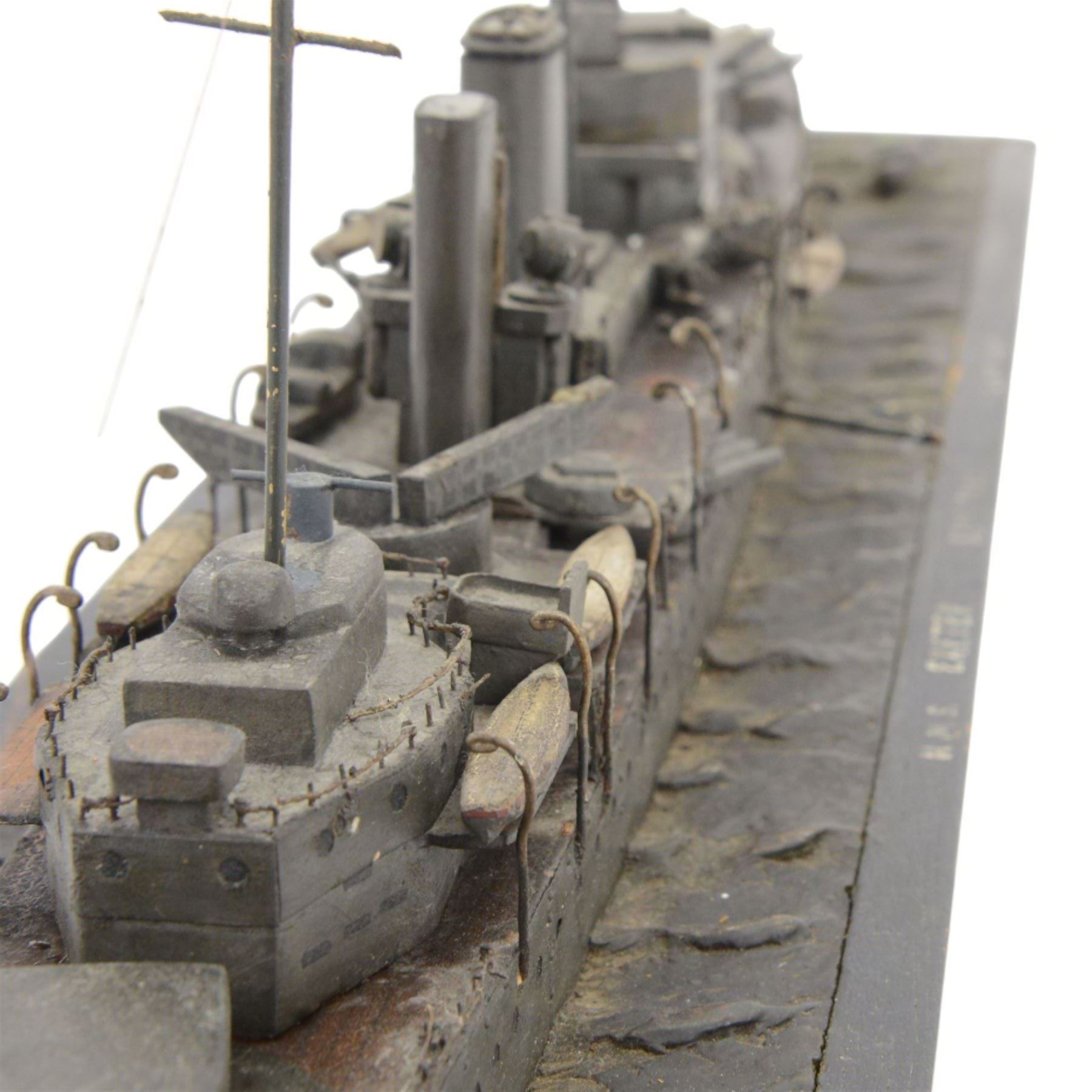  HMS Exeter, Waterline wartime metal model upon a wooden base, circa 1939-45, H24cm, L82cm  