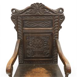 17th century style carved oak Wainscott chair, intricately carved back, united by a turned stretcher