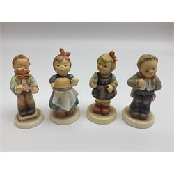 Thirty Hummel figures by Goebel, to include Saluting the Peacekeepers of Operation Joint Endeavor, on wooden plinth, Call to Glory, Celebrate with Song and Soldier Boy