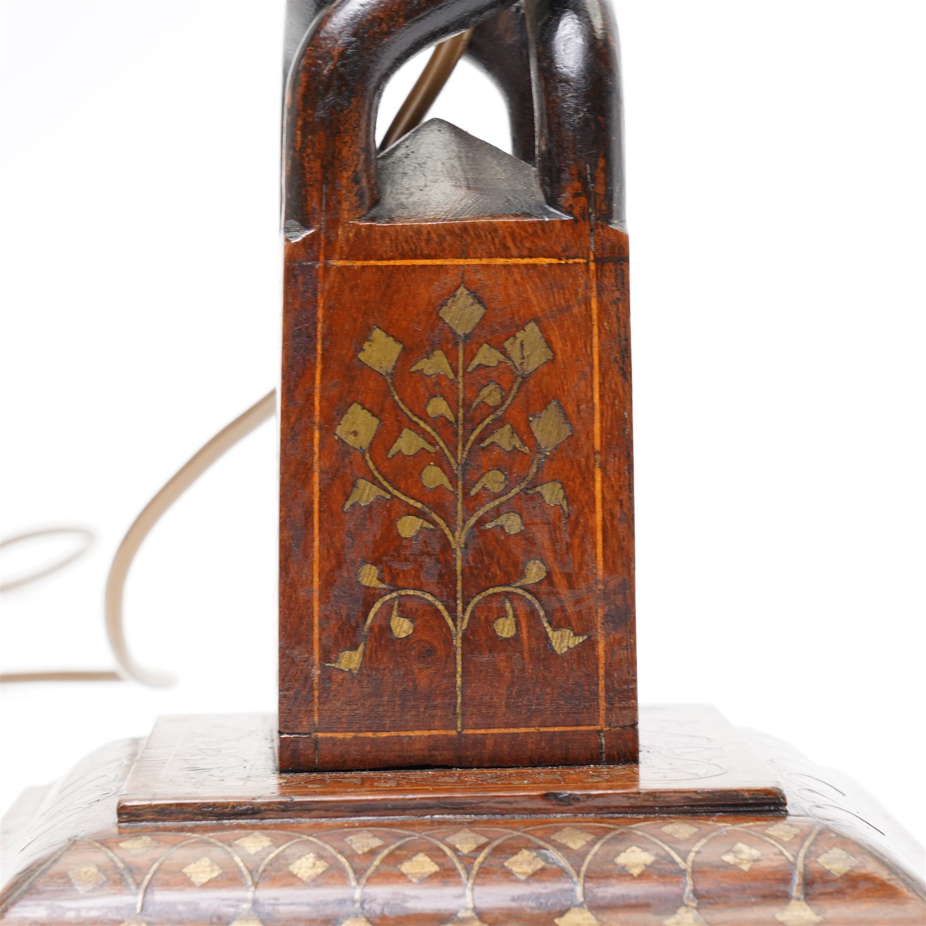 Early 20th century Arts and Crafts style Anglo-Indian table lamp, with open twist stem and gilt brass inlaid trailing vine and repeating arch pattern overall H53cm