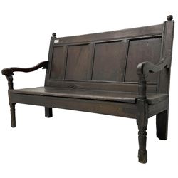 18th century oak hall bench or settle, quadruple panelled back with moulded rails, over a solid seat, raised on front turned supports