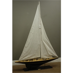  Wooden model of a yacht on stand with a metal plaque reading 'Endeavour', L112cm, W20cm, H155cm  