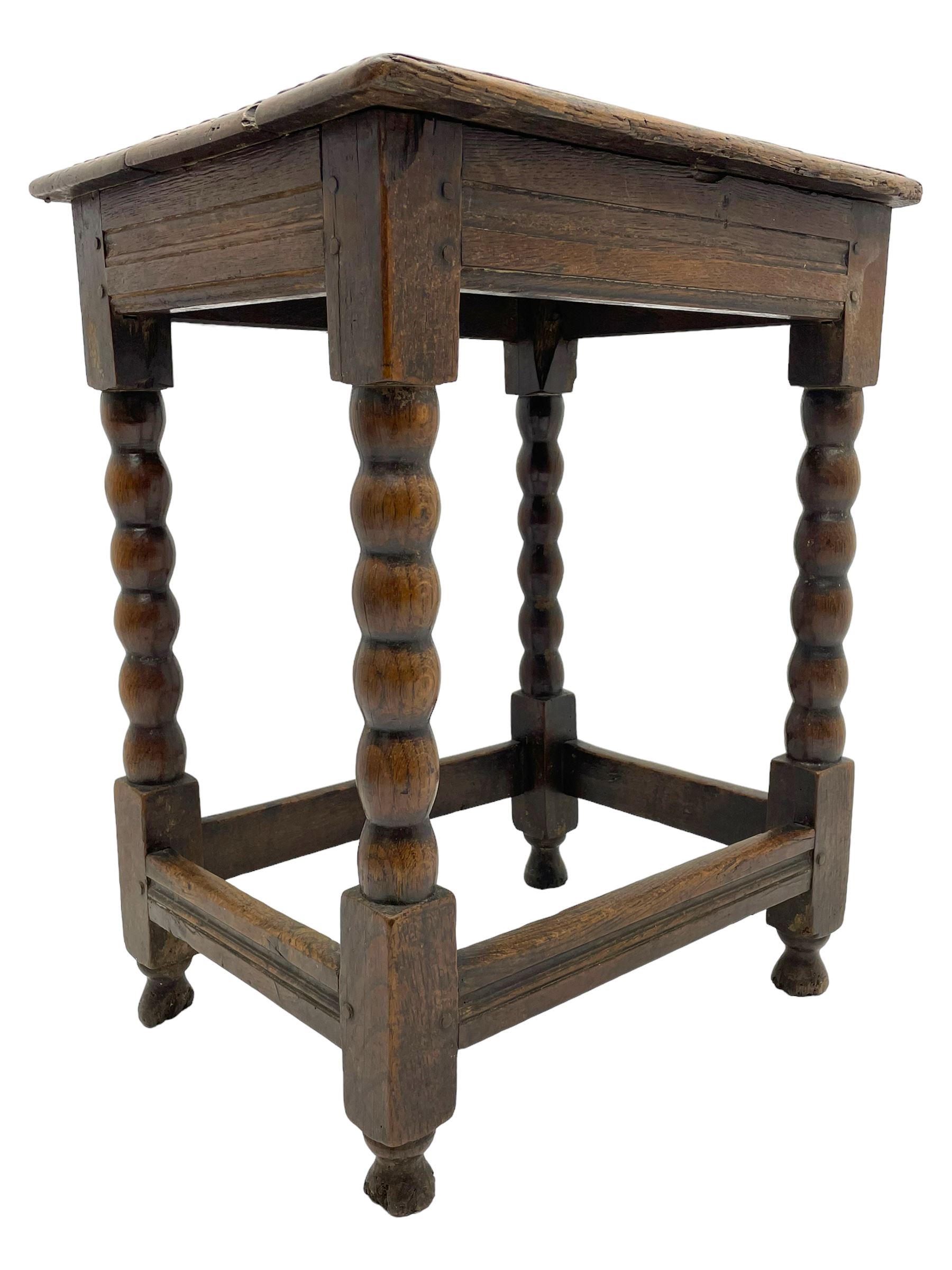 18th century oak joint coffin stool, moulded rectangular top over moulded frieze rails, raised on bobbin turned supports joined by moulded stretchers