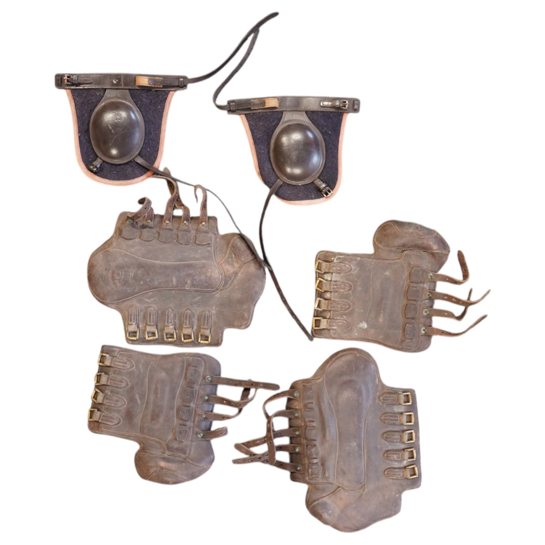 Set of Sabre brown leather brushing boots, together pair of knee protectors