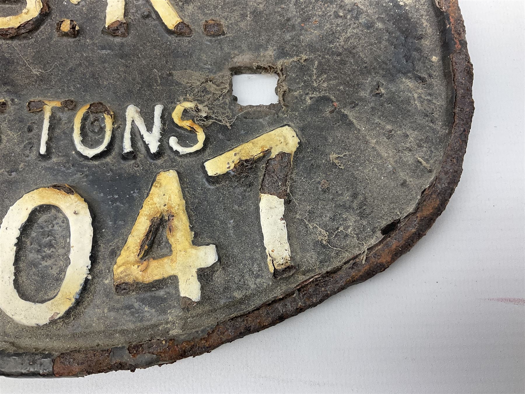 Three cast iron railway wagon plates of D shaped form to include Southern Railway, LMS and GWR, L27.5cm