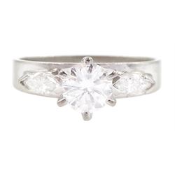 18ct white gold three stone round brilliant cut and marquise cut diamond ring, stamped, principal diamond approx 0.65 carat, total diamond weight approx 0.90 carat
