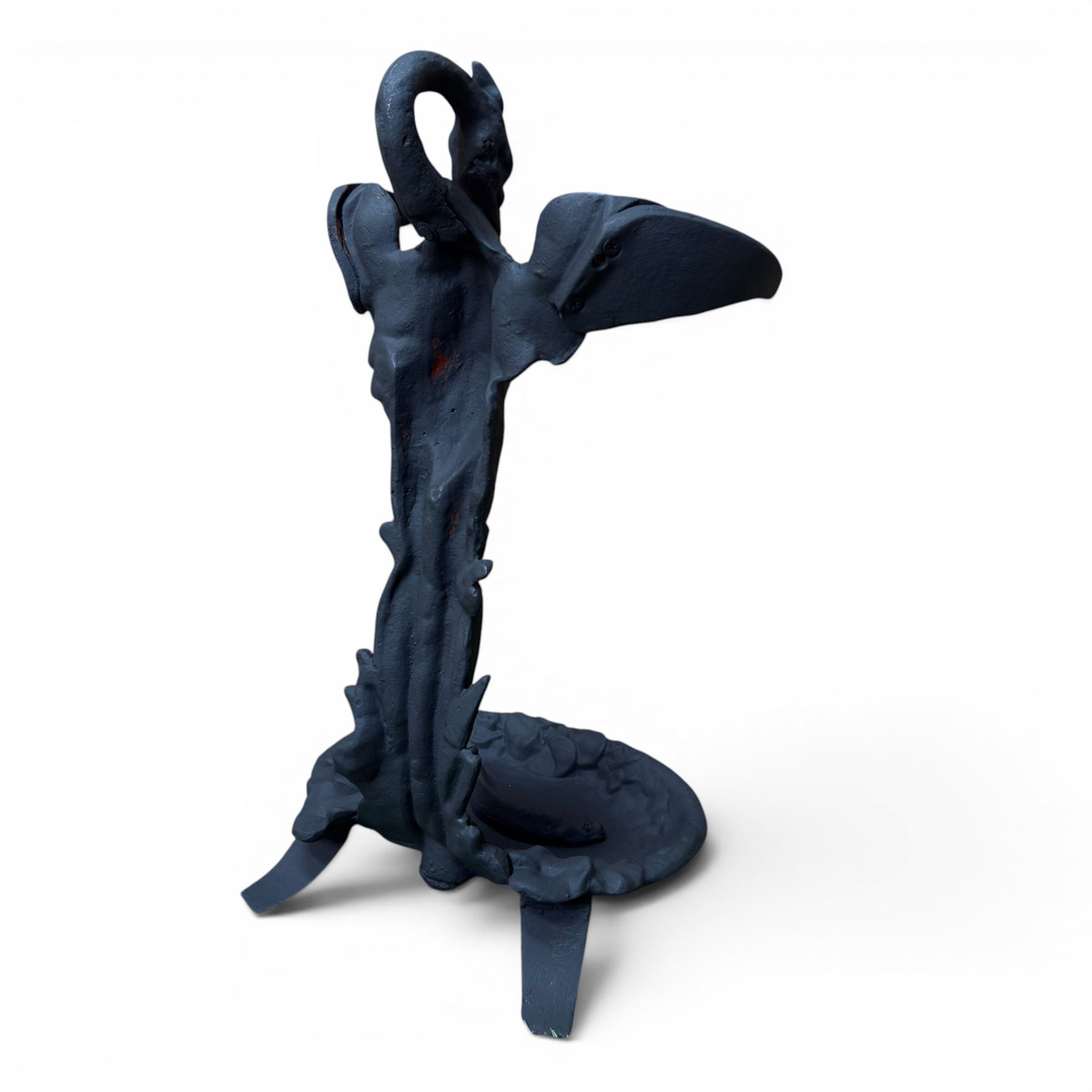After Coalbrookdale cast iron heron stick stand, ornate detail with fish base, painted in matt black, 20th century