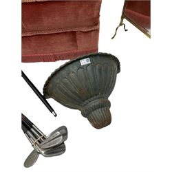 Cast iron wall planter or pocket (W42cm), small footstool upholstered in pink, collection of golf clubs, a paddle and a walking stick (5)