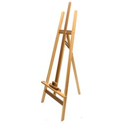 A pine floor standing artists easel, when closed H168cm.