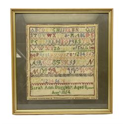 Victorian sampler, worked by Sarah Ann Duggleby, dated August 1864, depicting lines of alphabet, framed and glazed, by vendor repute Beswick Hall provenance, overall H46cm L43cm