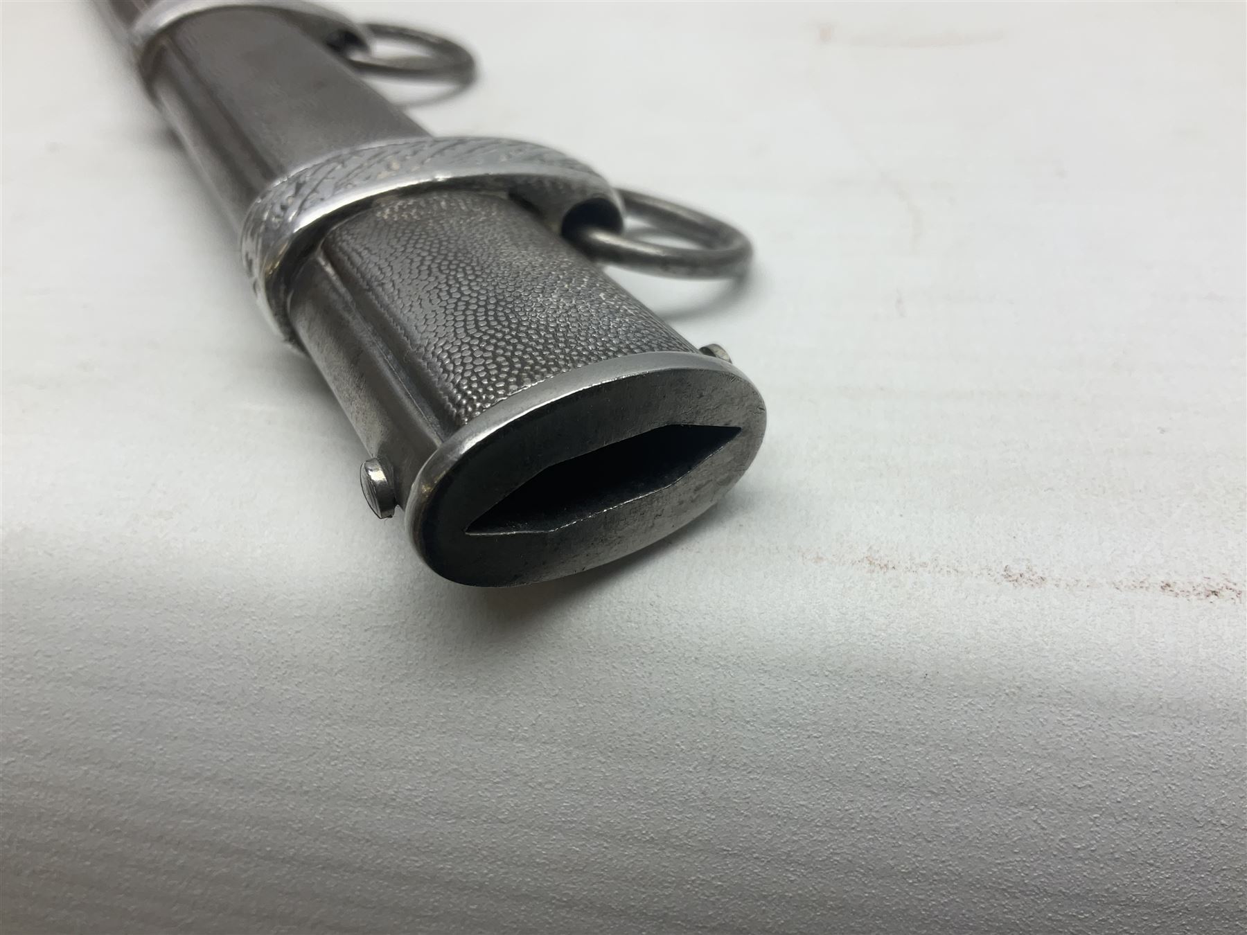 WW2 German Luftwaffe 2nd Pattern Officers dress dagger, with unmarked 25.5cm double edged steel blade, wire-bound pale orange/yellow celluloid grip, globular  pommel with oak leaves and traces of gilding, Luftwaffe eagle cross guard; in beaded scabbard with two suspension rings L43cm overall