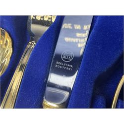 Bestecke Solingen canteen of gold plated cutlery for twelve place settings, including ladle, cake slice, fish servers, fish knives and forks, 108 pieces total, contained within a briefcase 