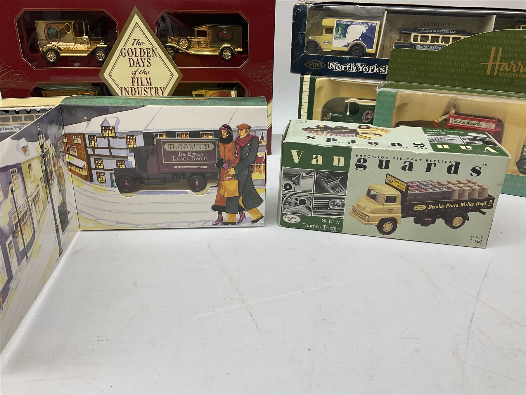 Collection of Diecast model vehicles, including Lledo The Golden Days of the Film Industry limited edition set, Lledo H Samuel boxed vehicle, and other similar examples 