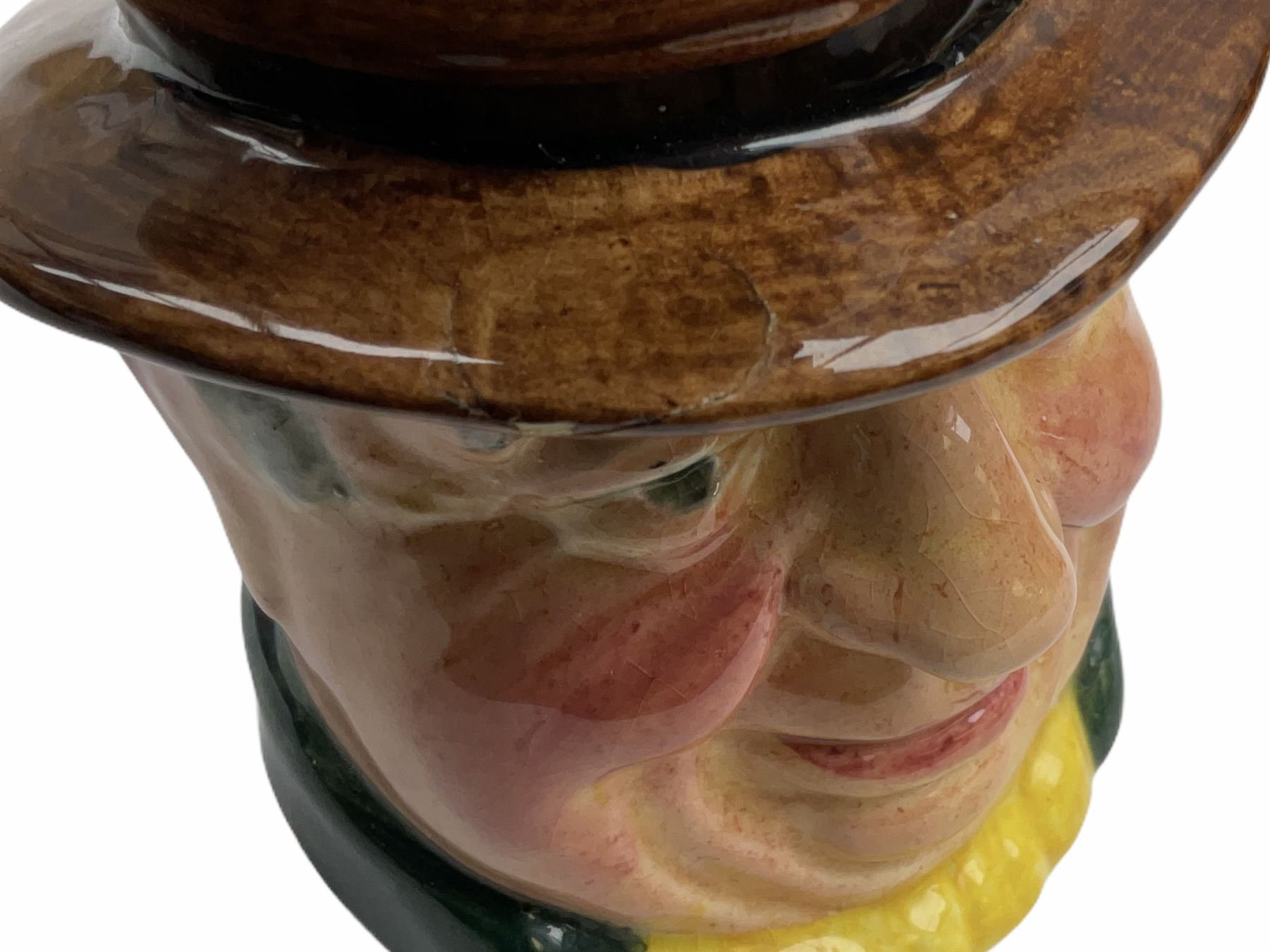 Character and toby jugs, including a staffordshire pottery style toby jug, Olfaire toby jug, Beswick character jug depicting Scrooge, Royal Doulton Veteral Motorist etc, together with Royal Doulton Sweet Dreams figure. 