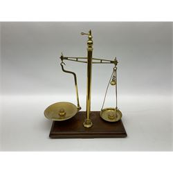 W & T Avery set of counter-top brass beam scales and weights, upon a stepped wooden plinth, H46cm