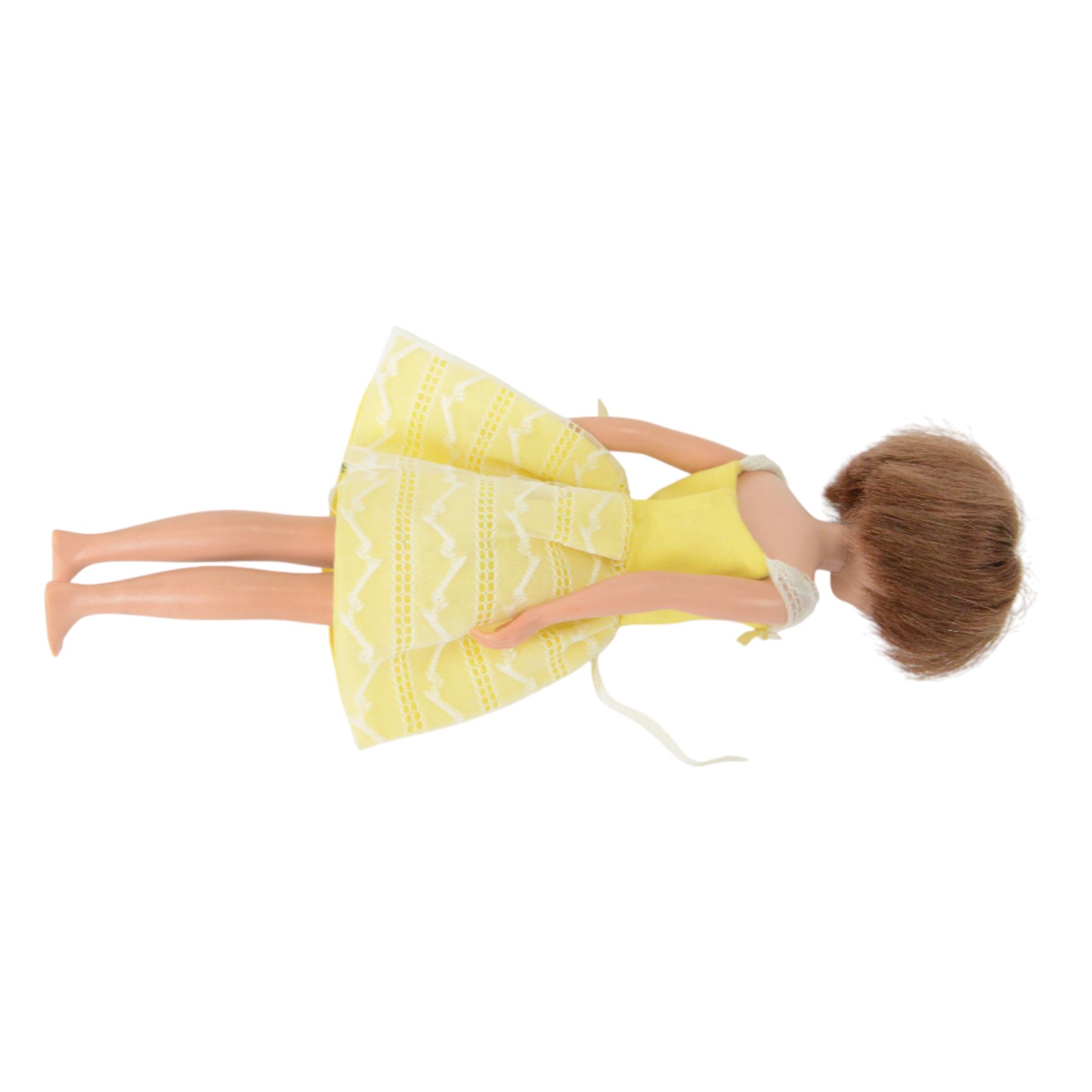 Collection of 1950s/60s Mattel Barbie dolls, including bubble cut Barbie circa 1962, with coral lips, blue eyeliner, red swimsuit and earrings, stamped 'JAPAN' to right foot, Fashion Queen Barbie, in gold and white swimsuit and headscarf, with three different wigs and a Ken doll circa 1961 in red striped shirt and shorts, together with a large quantity of 1960s Barbie and Sindy clothing, two doll stands and booklets