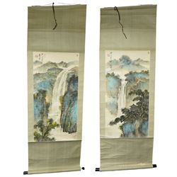 Circle of Aixinjueluo Yuting (Chinese 1952-): Waterfall Landscape and Mountainous Waterfall Landscape with Pagoda, pair watercolours on scroll backing indistinctly signed with artist's seals 89cm x 44cm (2)