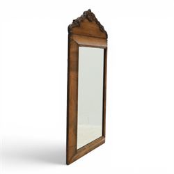 Late 19th century walnut dressing mirror, rectangular mirror plate within a moulded frame, shaped carved crest with floral and foliate detail
