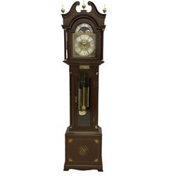 A  20th century longcase clock made to celebrate the millennium in the year 2000, this clock being No 2 of only 200 manufactured by  Richard Broad in Bodmin Cornwall, with a mahogany effect case and traditional swans neck pediment with three brass finials, break arch hood door on a trunk with recessed columns and full length glazed door, on a square plinth with inlay and a shaped base, brass dial with brass spandrels, silvered chapter ring, seconds dial and working moon phase to the arch, weight driven three train movement striking the quarters and hours on 12 gong rods, with a choice of St Michael, Westminster and Wittington chimes, with chime selector and chime/silent facility. With three brass cased weights and gridiron pendulum.





