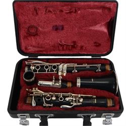 Yamaha 26 student clarinet, with a resin body and chrome keys, in a velvet lined and padded hard case.