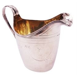 George III silver cream jug, of helmet form with curved strap handle, the body engraved with cartouche and foliate swags, hallmarked Newcastle, makers mark and date letter indistinct, including handle H9.5cm, approximate weight 3.14 ozt (97.7 grams)