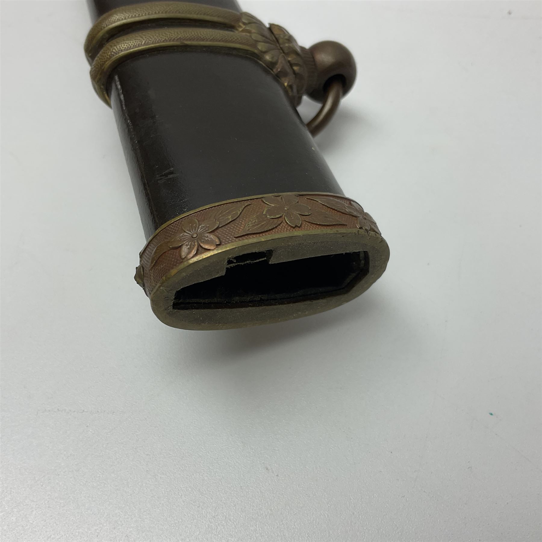 WW2 Japanese Army officer's shin gunto/katana sword with 68.5cm steel single edged blade, foliate cast brass tsuba, bound fish-skin grip with brass mounts, inscribed marks to both sides of tang; in lacquered wooden scabbard with brass mounts and locking button L97cm overall