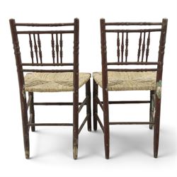 Pair of 19th century lacquered faux bamboo rush seated side chairs chairs, original blue paint under later ox-blood lacquer finish