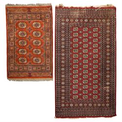 Two hand-knotted rugs, comprising Turkoman Ersari rug and Bokhara rug, Turkoman Ersari han...