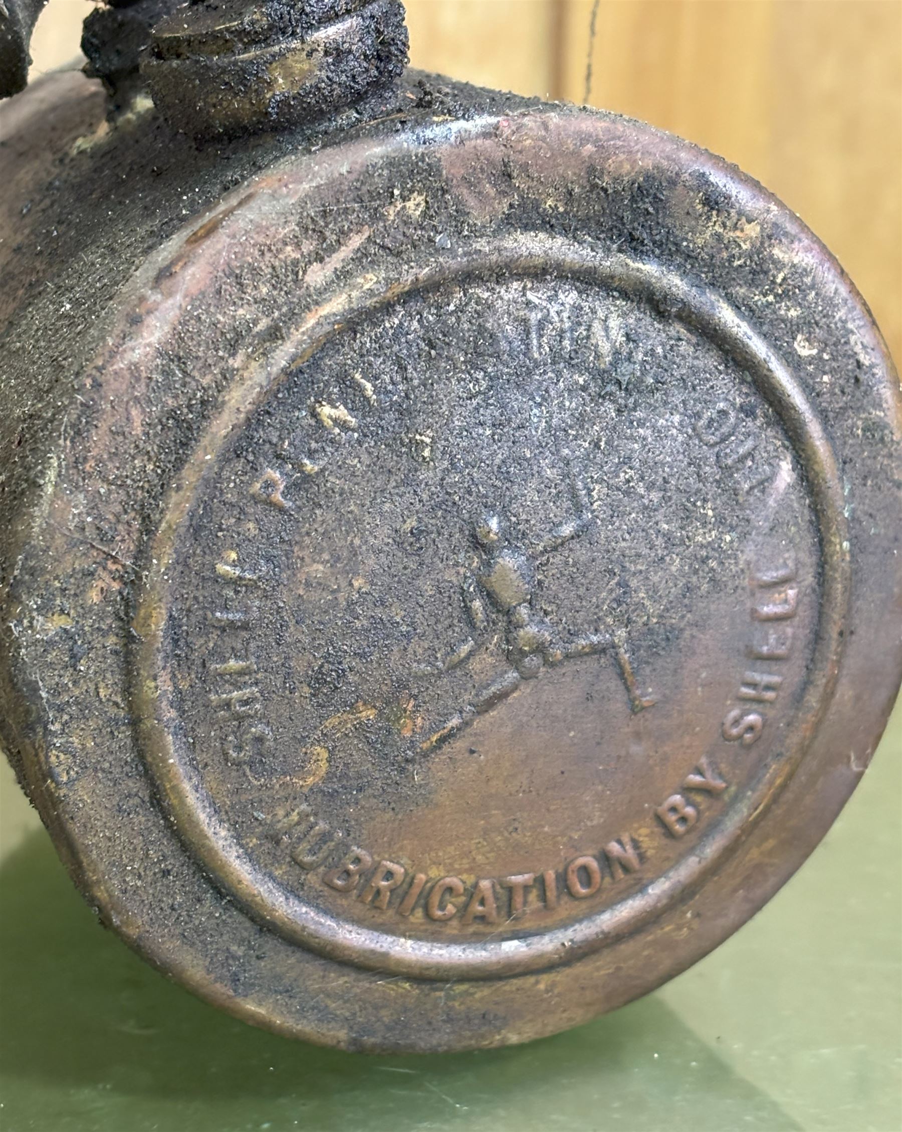 Rare early Shell advertising brass penetrating oil can, the can embossed to each side with the stick / robot man motif, and reading 'Penetrating oil can lubrication by Shell' (L71cm) together with two other early motoring oil hand pumps, one signed 'Erot' and the other 'Nesthill Royalty PAT.' (3) - COLLECTION BY APPOINTMENT FROM: The White House, Thirsk Road, Easingwold, York, YO61 3NF - CALL 01723 507111 TO ARRANGE