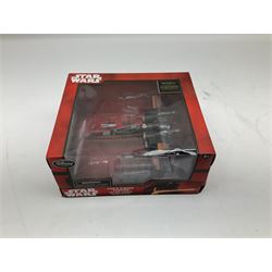 Star Wars - Disney Store The Force Awakens figurine playset, Poe's X-Wing Fighter, Snowspeeder and First Order Tie Fighter; Solo figurine set; The Last Jedi Elite Series die-cast action figure of Praetorian Guard; all mint and boxed; together with Star Wars Episode 1 card game, boxed (7)