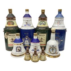 Bells, Scotch whisky, in seven Wade ceramic decanters, comprising two Christmas decanters 1990 and 1991, 60th birthday of Queen Elizabeth II decanter, Golden Wedding anniversary of the Queen and the Duke of Edinburgh decanter, Birth of Princess Beatrice decanter, Birth of Princess Eugenie decanter and Queen's mothers, together with Bells, blended Scotch whiskies, three miniatures in Wade ceramic decanters, various contents and proofs