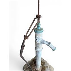 Georgian period lead garden water pump, with iron handle, set in square stone base