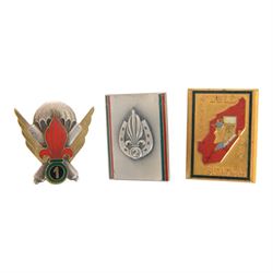 French Foreign Legion etrangere badges comprising seven  Kepi Blance Replacements and two Legion Cavalerie badges
