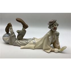 Collection of seven Lladro figures, including Seated ballerina with swan 6204, Childhood Dream 8129, Dancer 5050, reclining clown with ball alongside a selection of other figures. 
