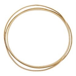Two 17ct gold bangles and a 9ct gold bangle