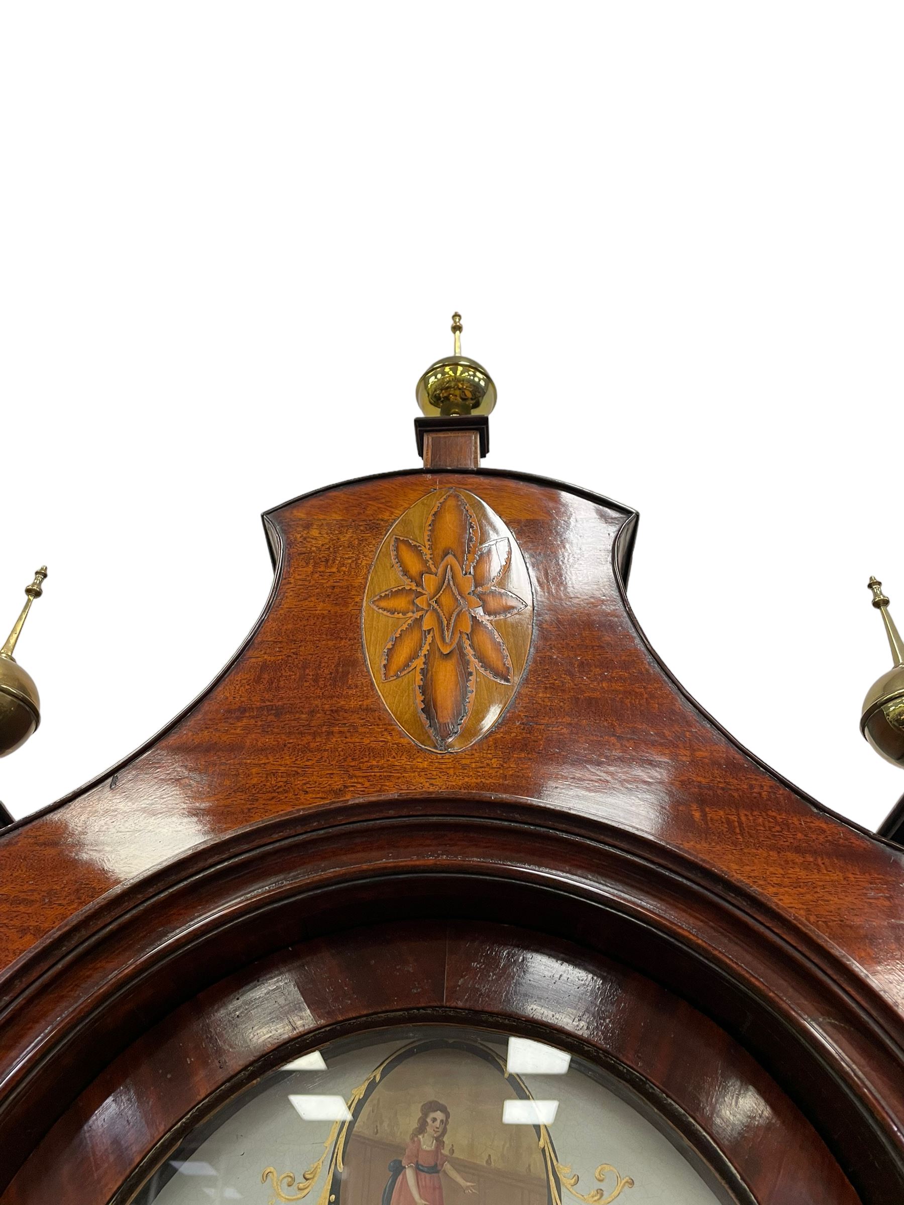 Denton & Fox of Hull – Early 19th century mahogany 8-day longcase clock c1802, pagoda pediment with an oval inlay and three ball and spire finials, break arch painted dial and hood door flanked by reeded pilasters with brass Corinthian capitals, long trunk door with conforming break arch top on a rectangular plinth raised on bracket feet, early Wilson (Birmingham) dial with Roman numerals, five minute Arabic’s and minute dots, subsidiary seconds dial and calendar aperture, with matching steel hands, floral spandrels within raised gesso work and a conforming oval depiction of a young maiden and dog to the break arch, dial pinned via a falseplate to a rack striking movement with a recoil anchor escapement striking the hours on a cast bell. With pendulum and weights.
Joseph Denton was a respected and prolific Hull clock maker working in Scale Lane Hull 1779 and Silver Street 1782-1814. Entering a short-lived partnership with Charles Fox from Beverley in 1802.
