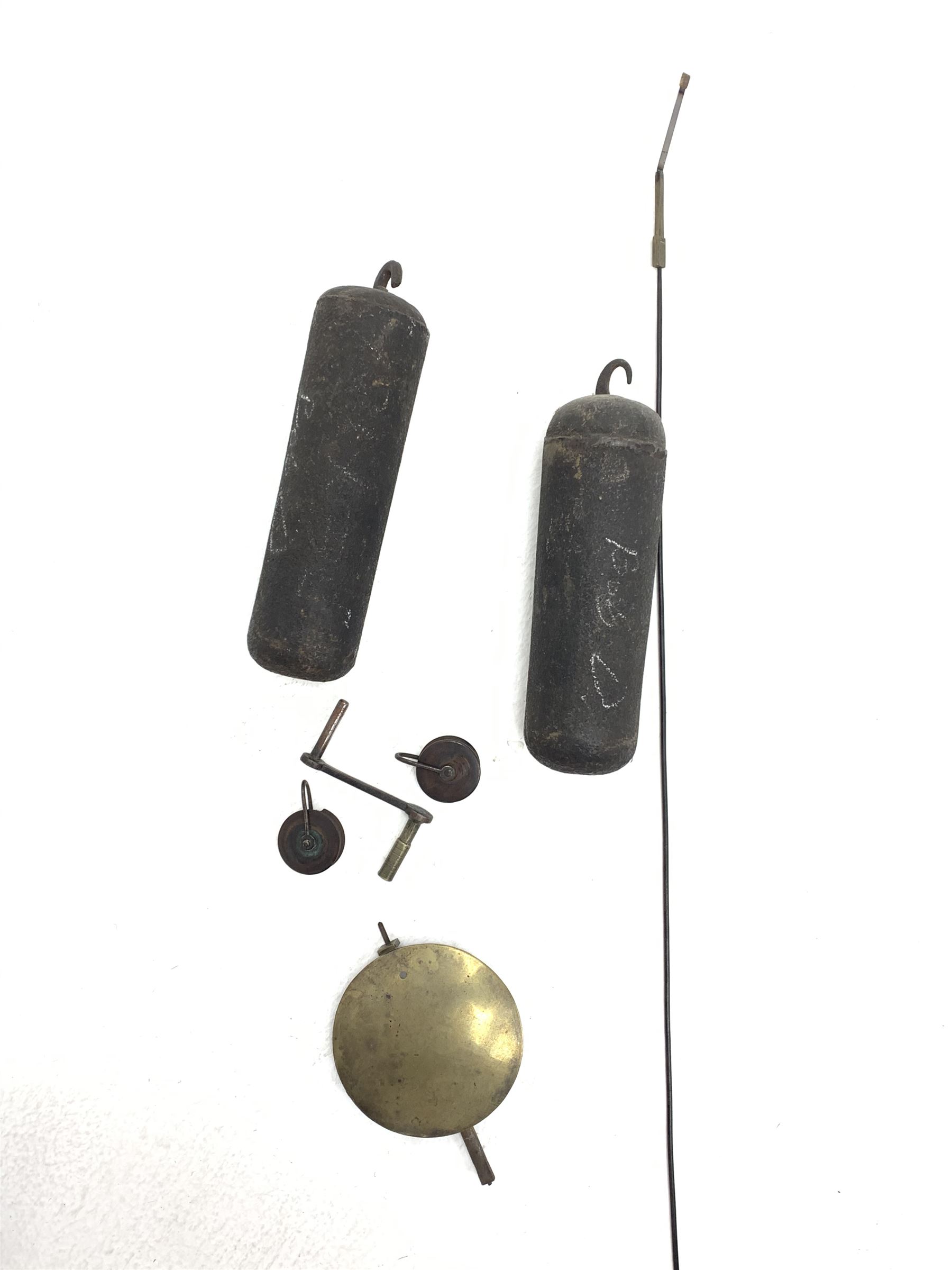 Early 19th century oak longcase clock, shaped pediment over a stepped arch glazed door enclosed by plain pilasters, the case with canted corners and trunk door with sloped arch top and centre curved return, enamel Arabic dial painted with flowers and patterned spandrels, signed 'Jno. Hilbert, Haxby', eight-day movement with subsidiary seconds dial and false calendar dial 